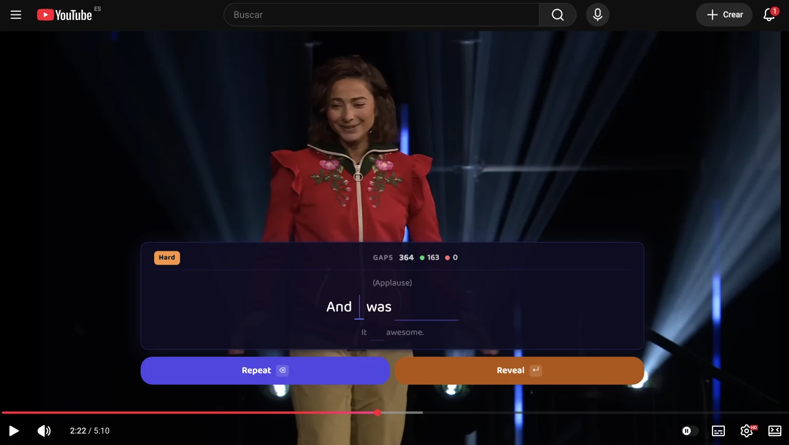 The Gappier extension on youtube.com: the exercise sits over the video itself, with the subtitle line and its blanks.